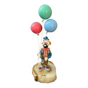 Ron Lee Clown Holding Balloons